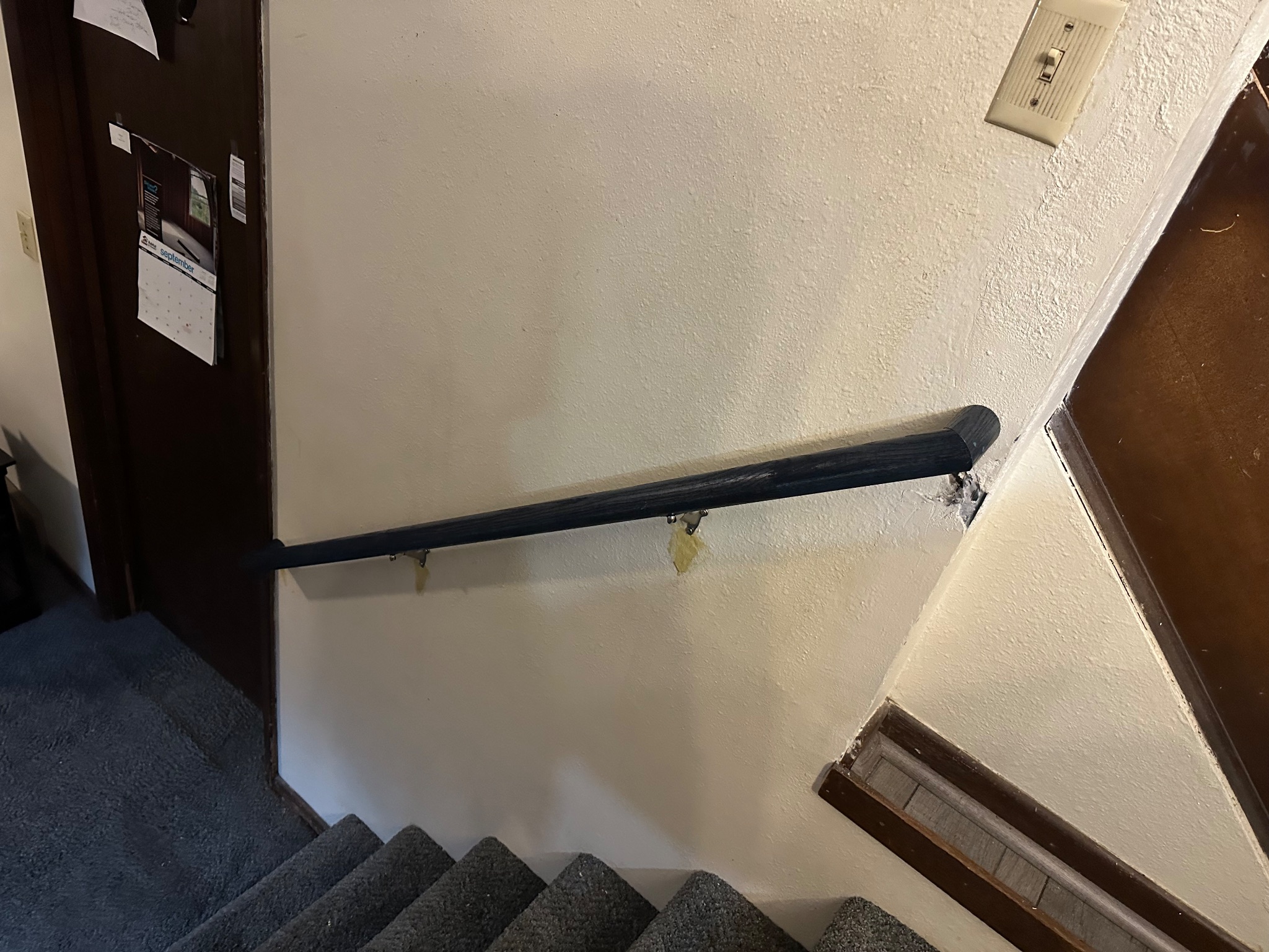 Another view of the previous handrail system before replacement in Ames, IA