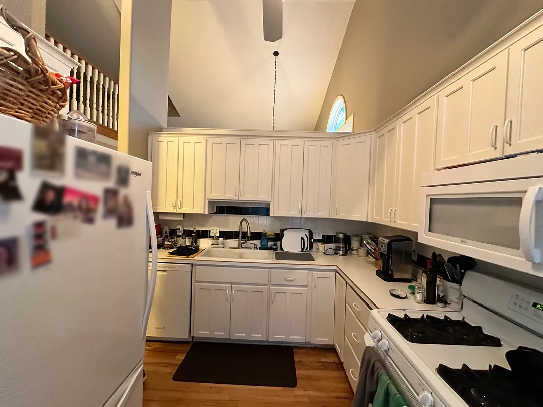 Before photo of a kitchen showing original layout and dated finishes in Des Moines.